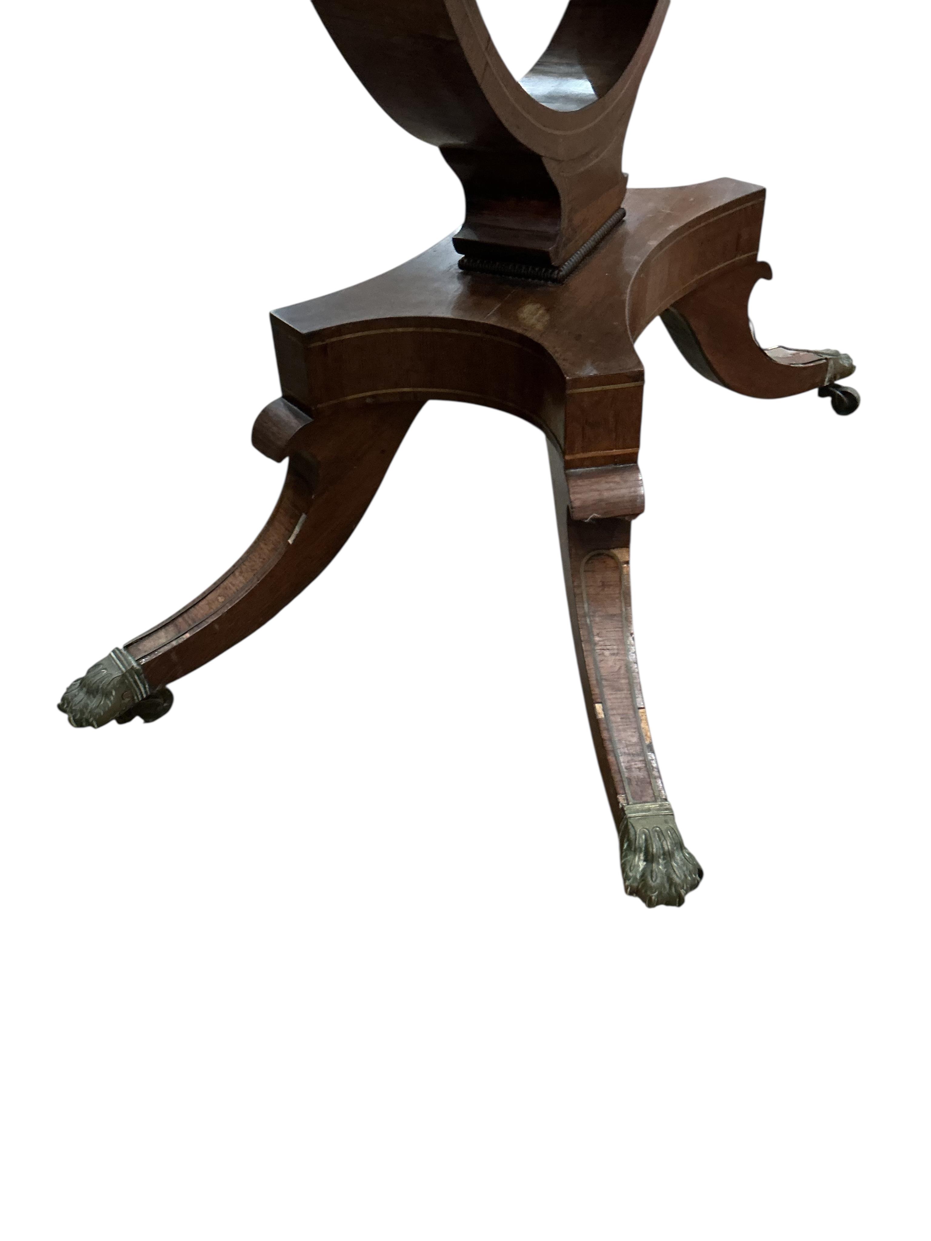 A Regency brass mounted rosewood folding card table, width 89cm, depth 44cm, height 74cm